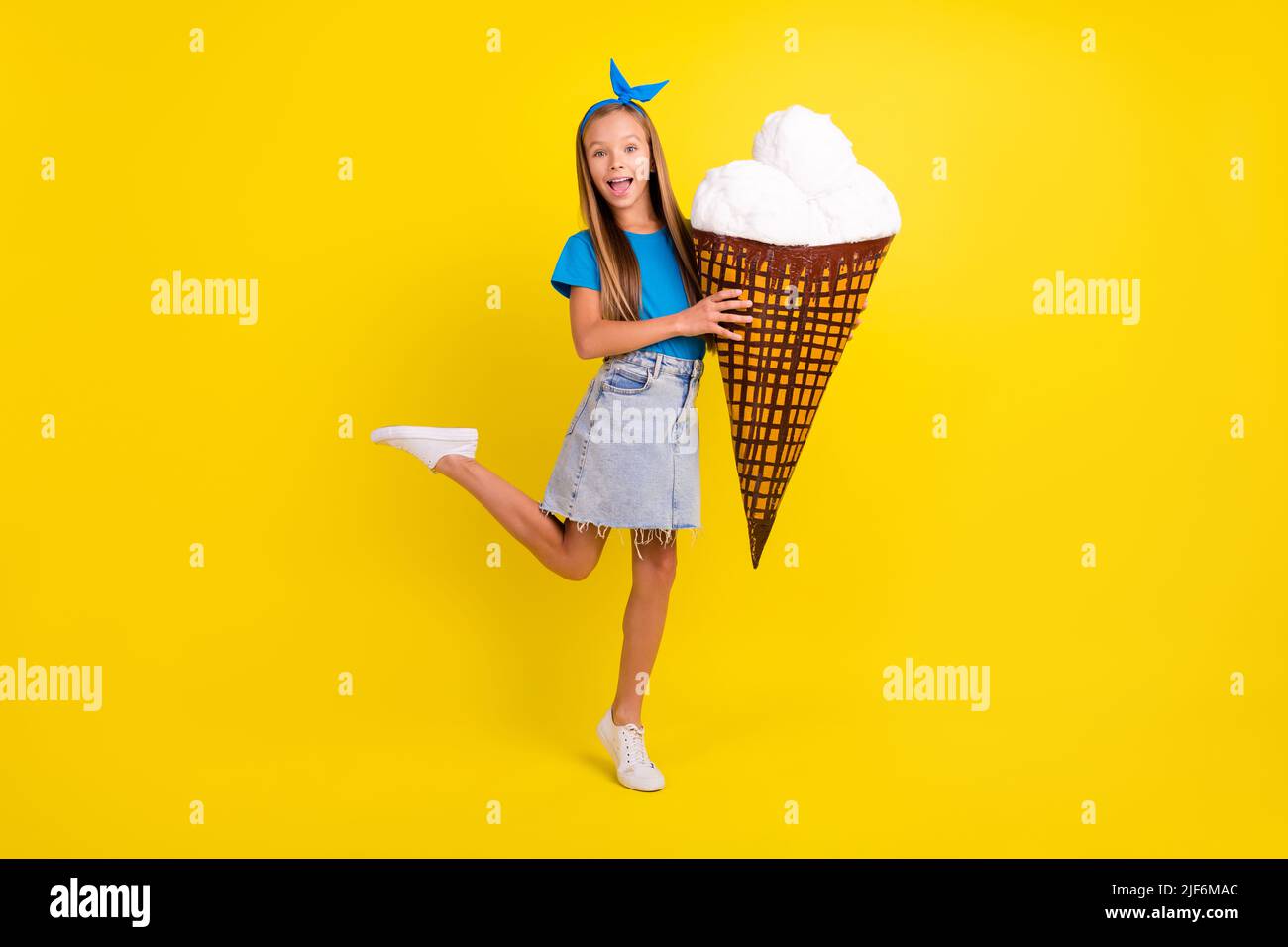 Full length photo of positive excited pupil stand one leg tip toe raise