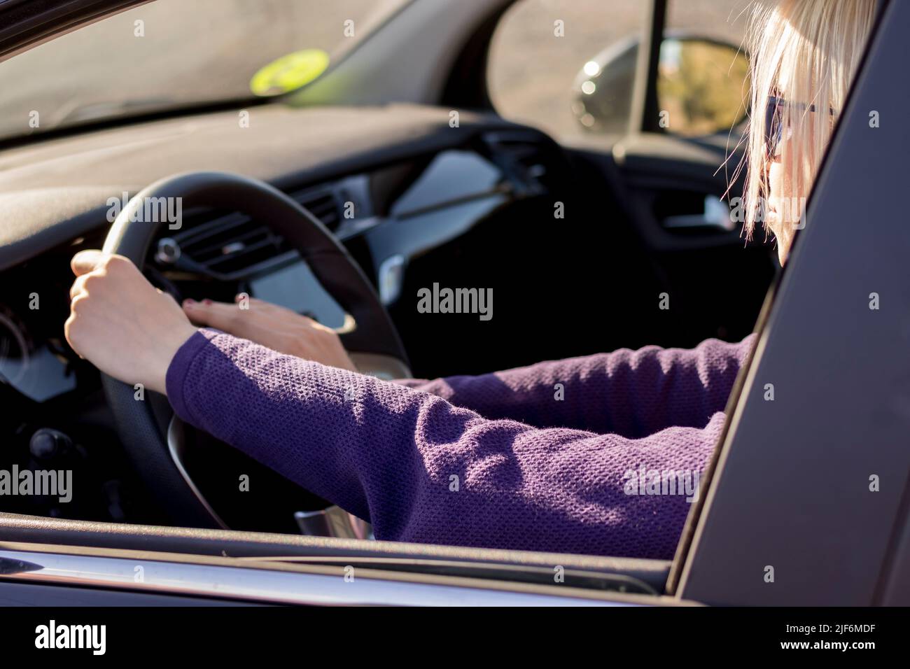Woman honking car horn hires stock photography and images Alamy
