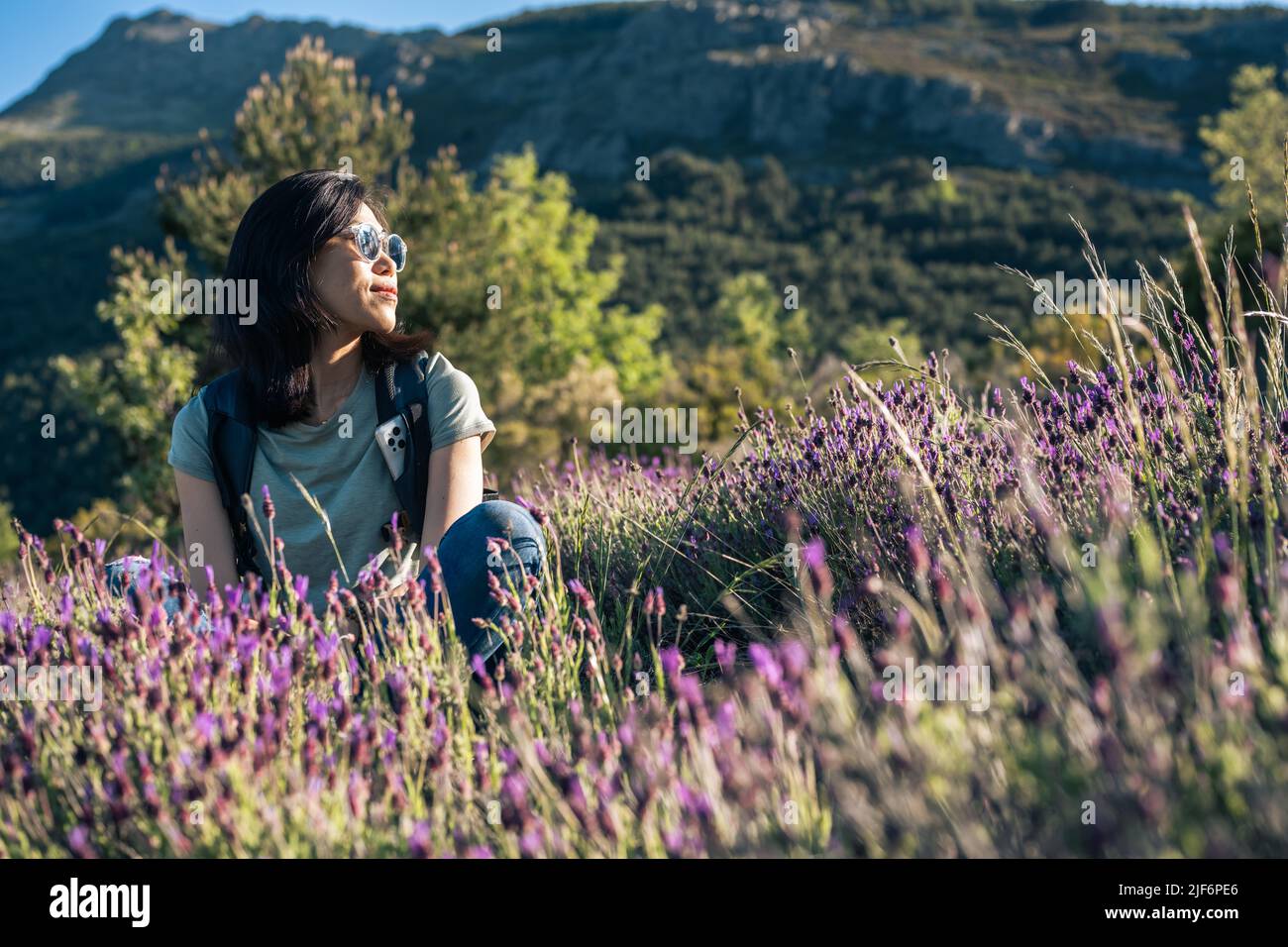 Female hiker wildflowers hi-res stock photography and images - Alamy