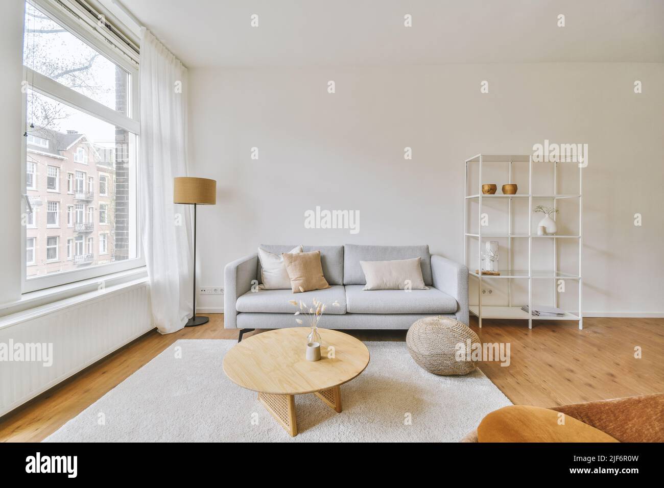 Stylish home interior design of spacious living room with large windows ...