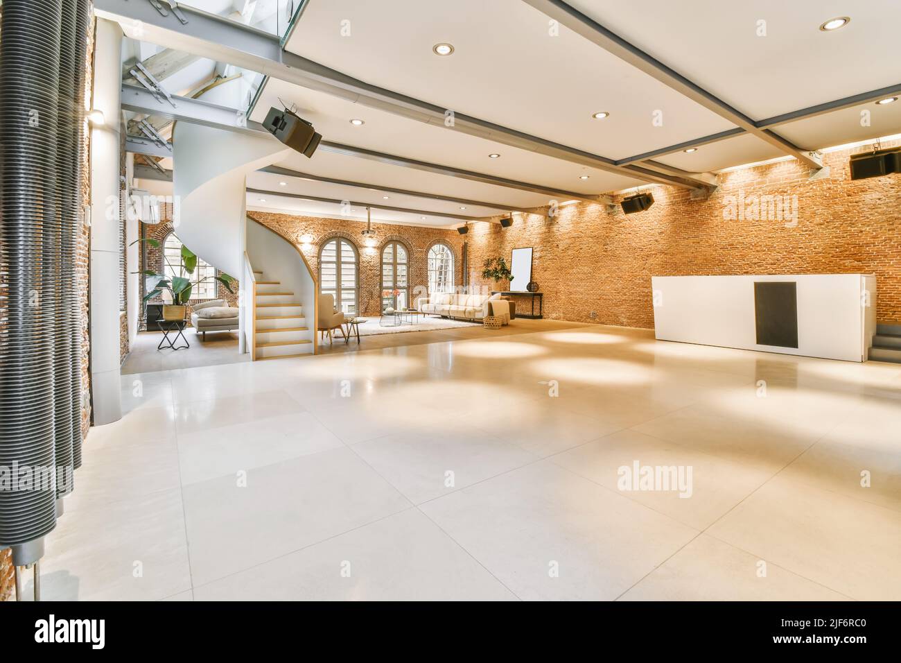 Stairway in spacious corridor with tiled floor near living room with