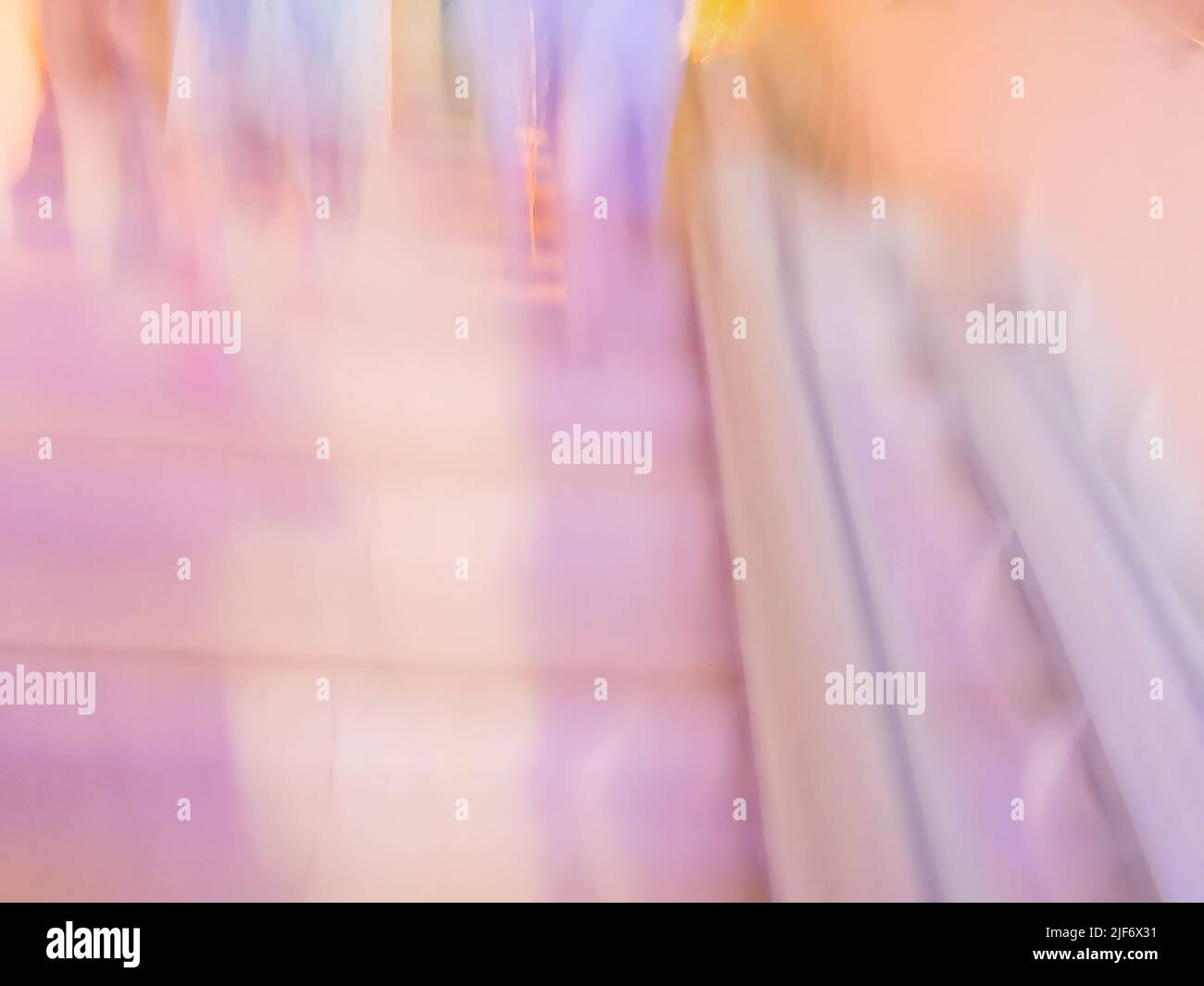 Blurry abstract background with blurred crowds diverse ages and genders. Fluidity of the crowds blur bokeh Stock Photo
