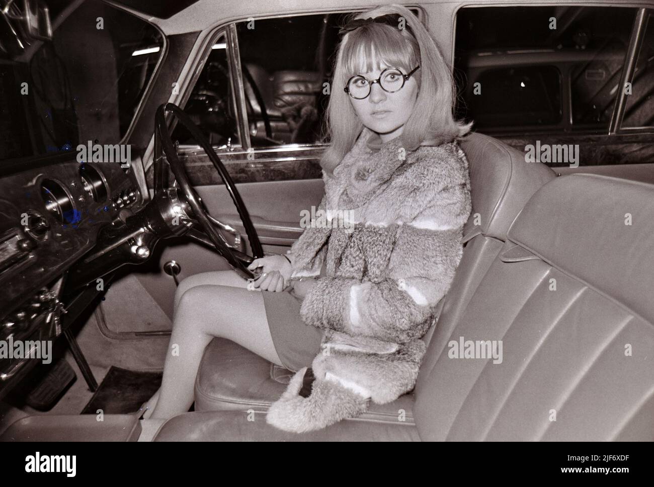 LULU Scottish pop singer at her home in Townshend Court, St John's Wood, north London in May 1967 with her Vanden Plas Princess car. Stock Photo