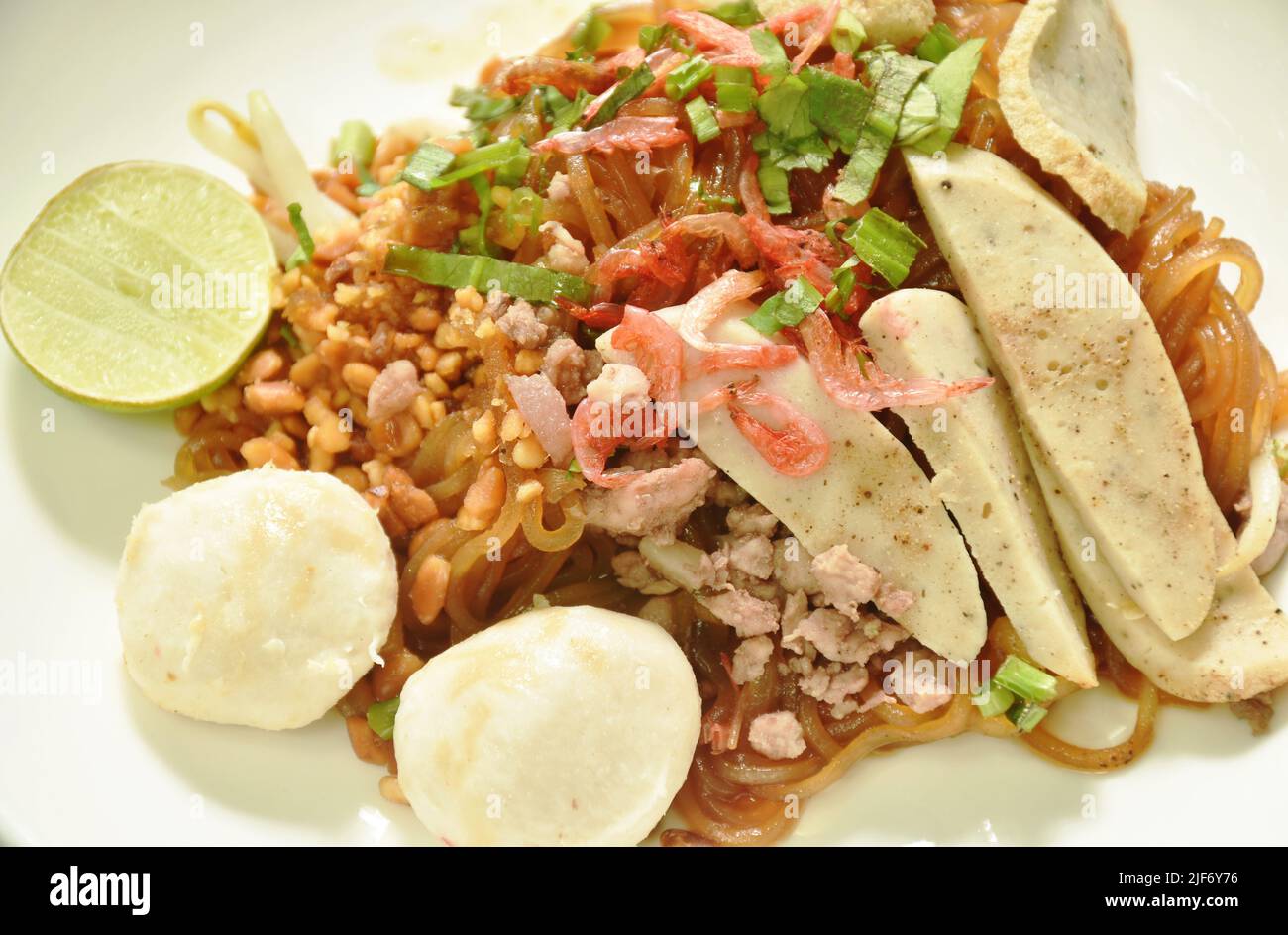 stir fried thin rice noodle with pork meatball dressing dry shrimp in black sweet soy sauce on