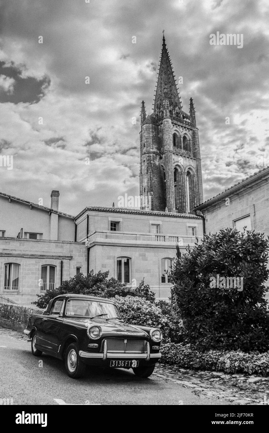 Pretty little car parked in the street. Triumph Herald 948 Coupe Stock Photo