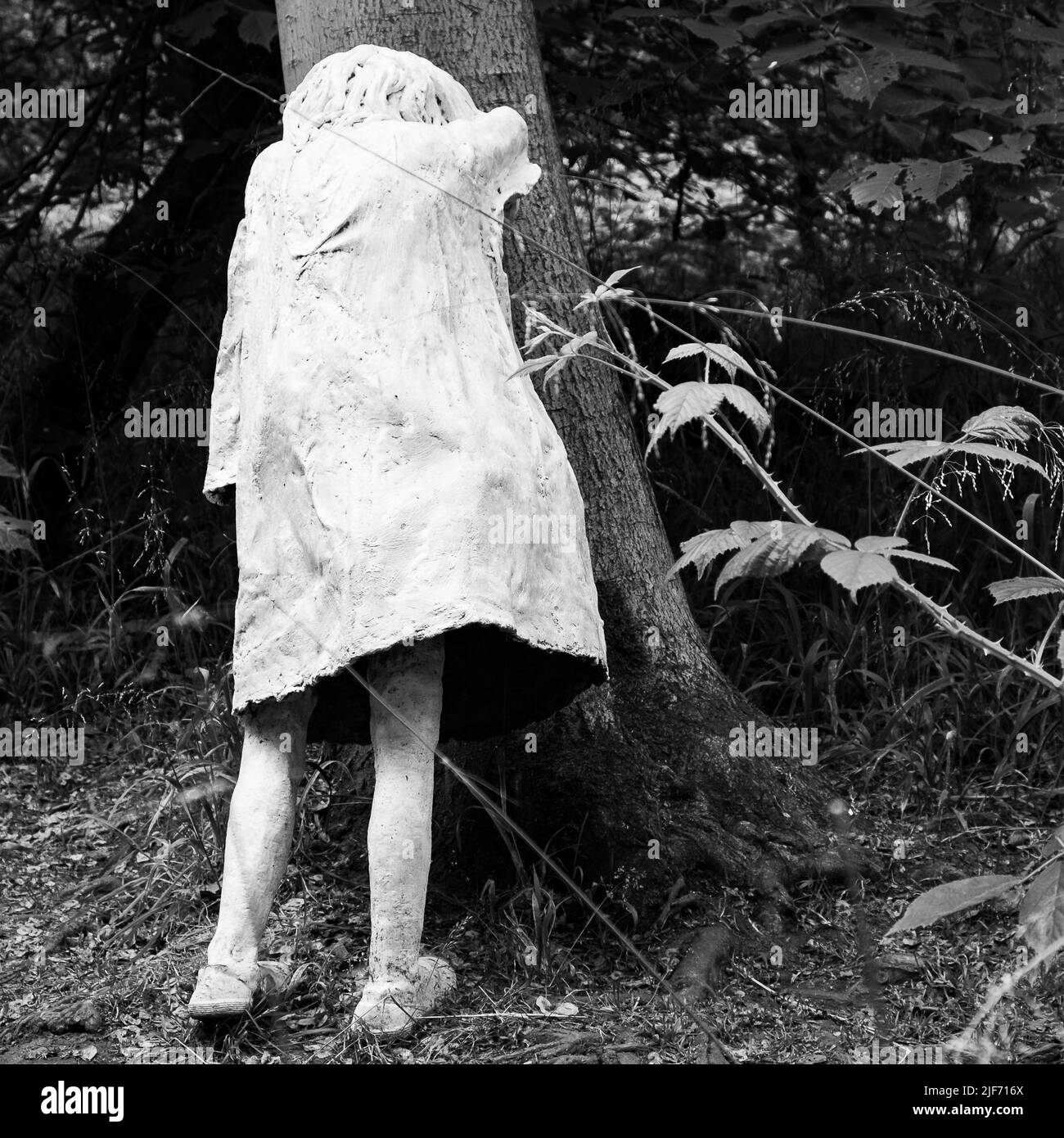 Weeping girl sculpture by Laura Ford taken at Jupiter Artland, Lothian Stock Photo