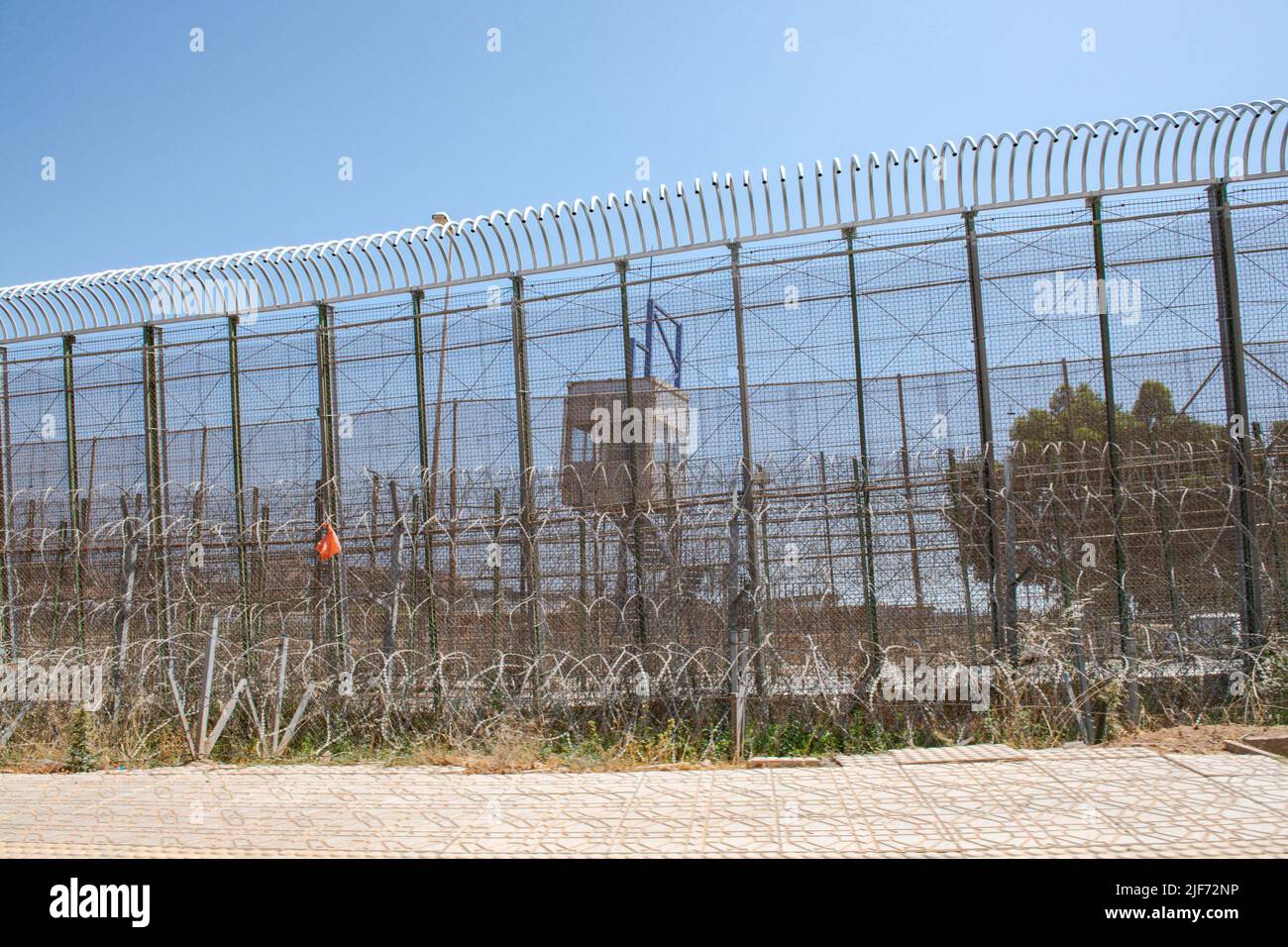 Border fence between Morocco and Spain in the Barrio Chino area where ...