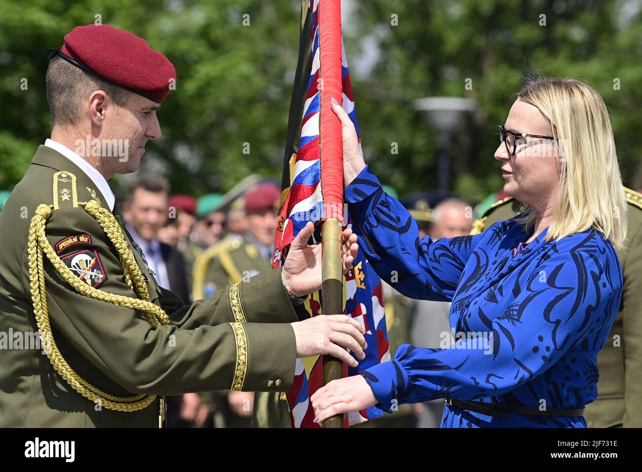 Prague, Czech Republic. 30th June, 2022. On the occasion of Armed Forces Day the Chief of Staff Ales Opata (not seen) passes the post to Brigadier General Karel Rehka (left) at Vitkov National Memorial, Prague, Czech Republic, on June 30, 2022. On the right is Defence Minister Jana Cernochova. Credit: Roman Vondrous/CTK Photo/Alamy Live News Stock Photo