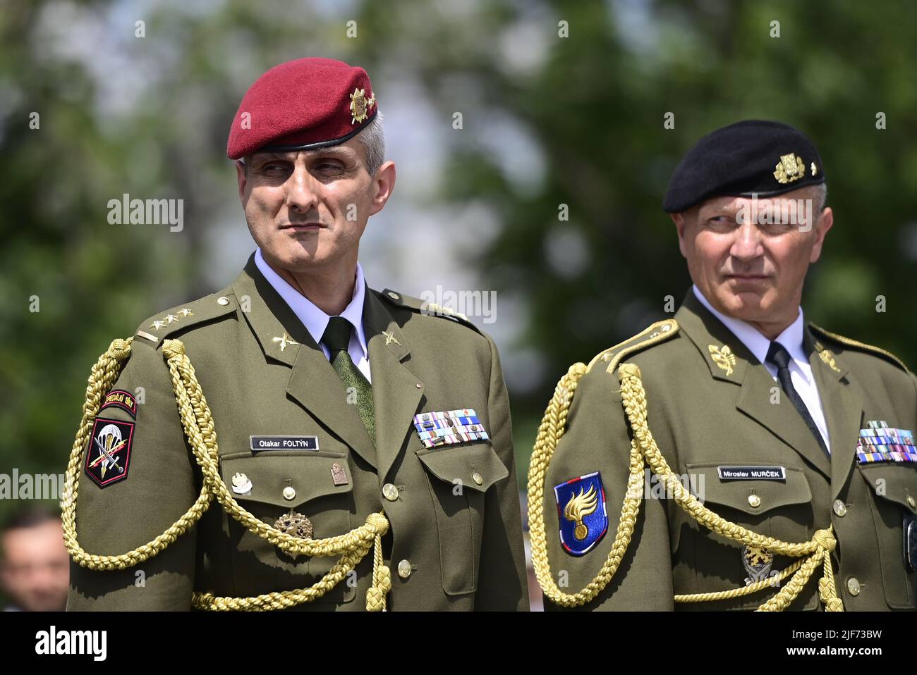 Prague, Czech Republic. 30th June, 2022. On the occasion of Armed Forces Day the Chief of Staff Ales Opata (not seen) passes the post to Brigadier General Karel Rehka (not seen) at Vitkov National Memorial, Prague, Czech Republic, on June 30, 2022. On the photo from left, new Military Police Chief Otakar Foltyn and outgoing Military Police Chief Miroslav Murcek. Credit: Roman Vondrous/CTK Photo/Alamy Live News Stock Photo