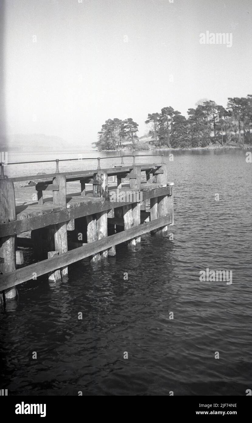 1950s, historical, Ullswater in the Lake District, Cumbria, England and a view from this era of Howtown Pier, a jetty where the Ullswater 'steamers', collect passengers for scenic lake cruises. Stock Photo