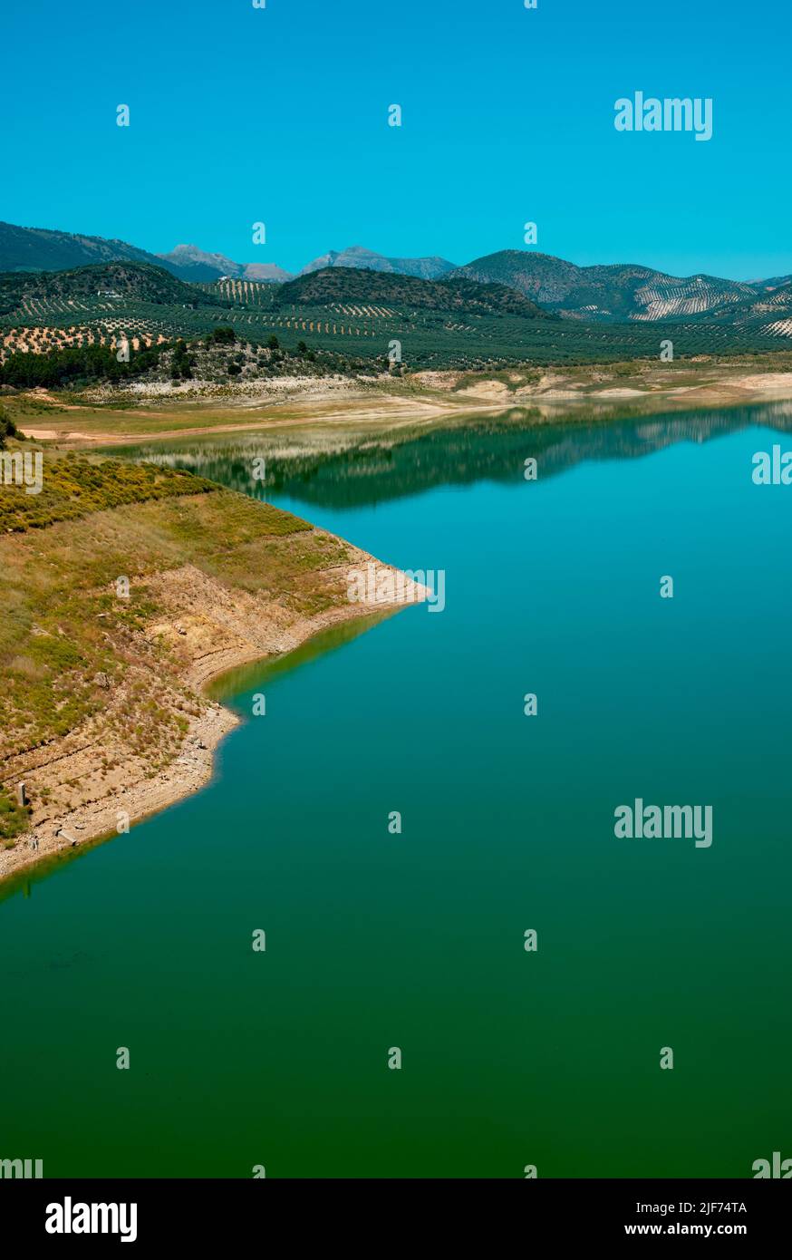 a detail of the Iznajar reservoir, with water from the Genil river, in Andalusia, Spain, in a sunny day Stock Photo