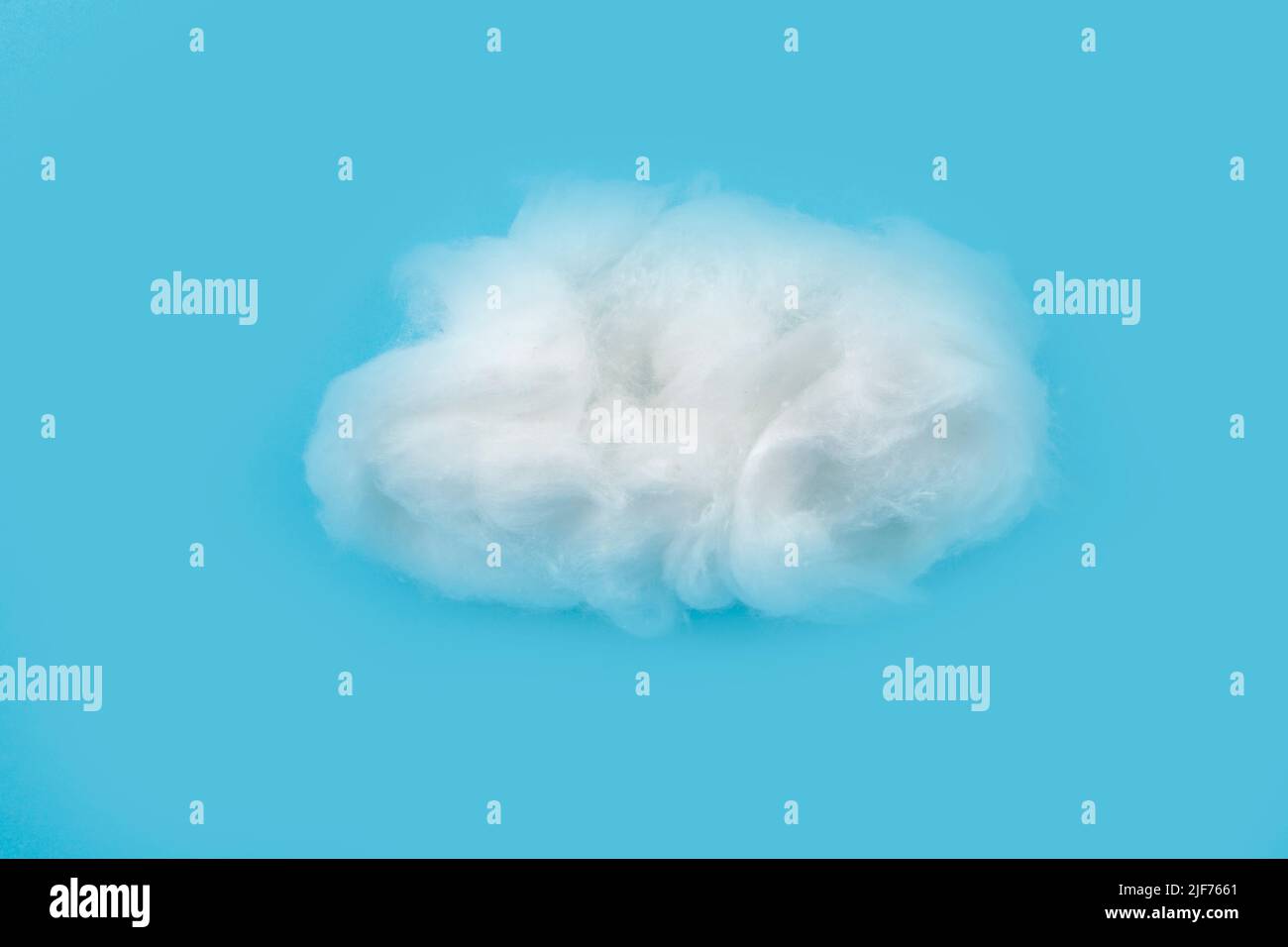 Cotton snow and cotton clouds in the sky. Cotton ball as a wool and  earsticks. White wall white chair white floor Stock Photo - Alamy