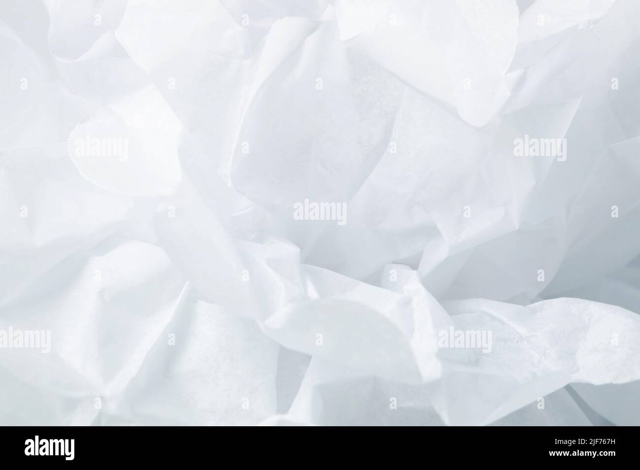 Background from white thin wrinkled paper. Stock Photo