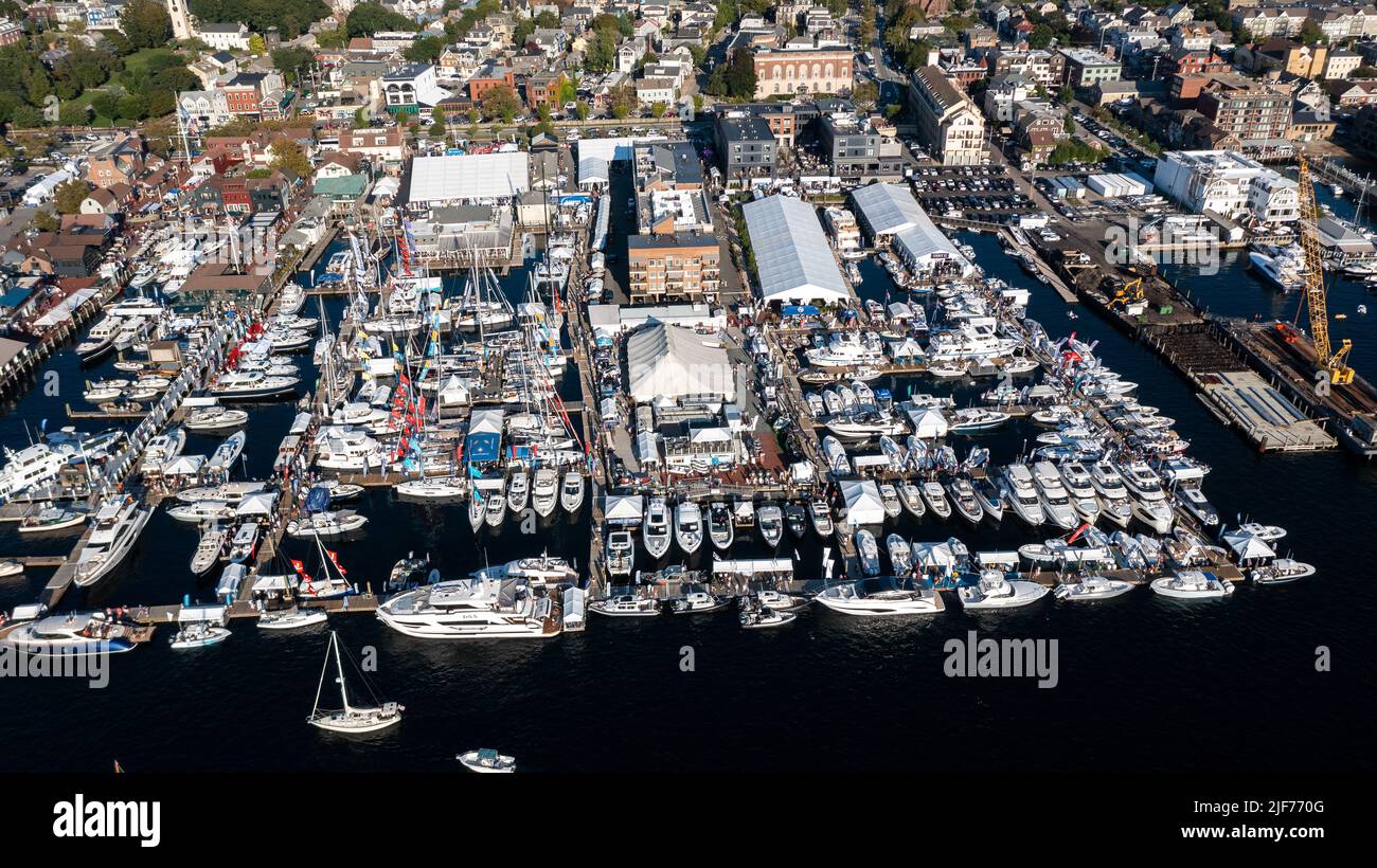 Aerial stock photos of the Newport Harbor, boats docked and moored in late afternoon sun at the Newport International Boat Show, Safe Harbor Shipyard. Stock Photo