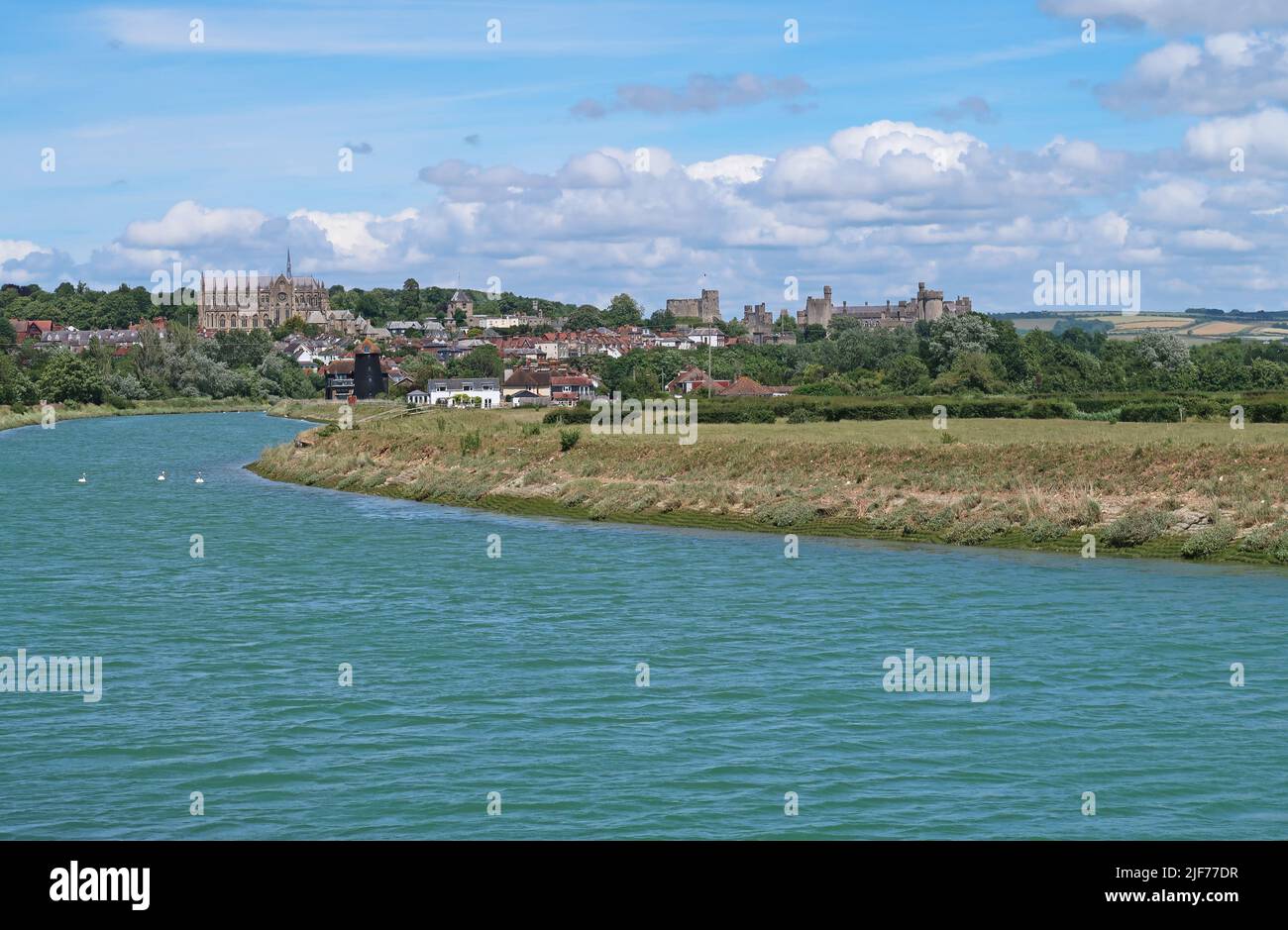 The River Arun in West Sussex, UK. View upstram at high tide showing Arundel Castle and cathedral in backround Stock Photo