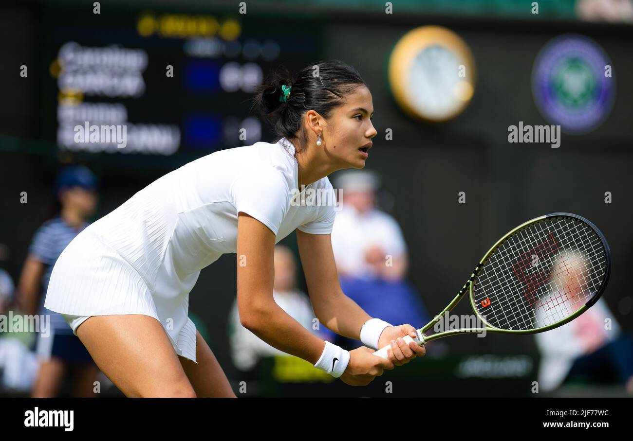 Wimbledon, England: June 29, 2022, Emma Raducanu of Great Britain in action  against Caroline Garcia of France during the second round of the 2022  Wimbledon Championships, Grand Slam tennis tournament on June