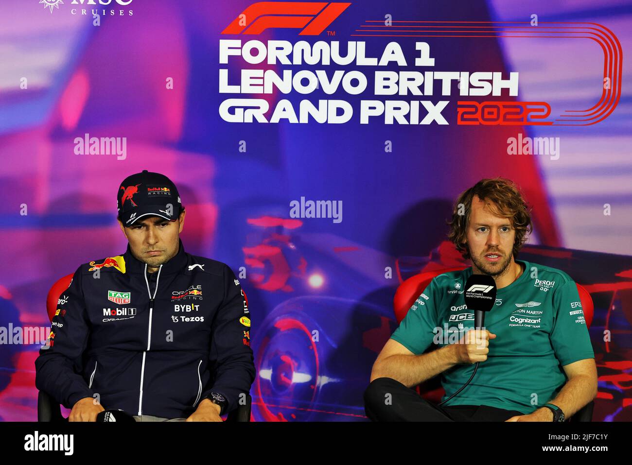 Vettel Conference (L to R): Sergio Perez (MEX) Red Bull Racing and Sebastian Vettel (GER ...