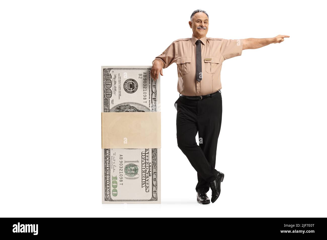 Security officer leaning on a stack of money and pointing isolated on white background Stock Photo