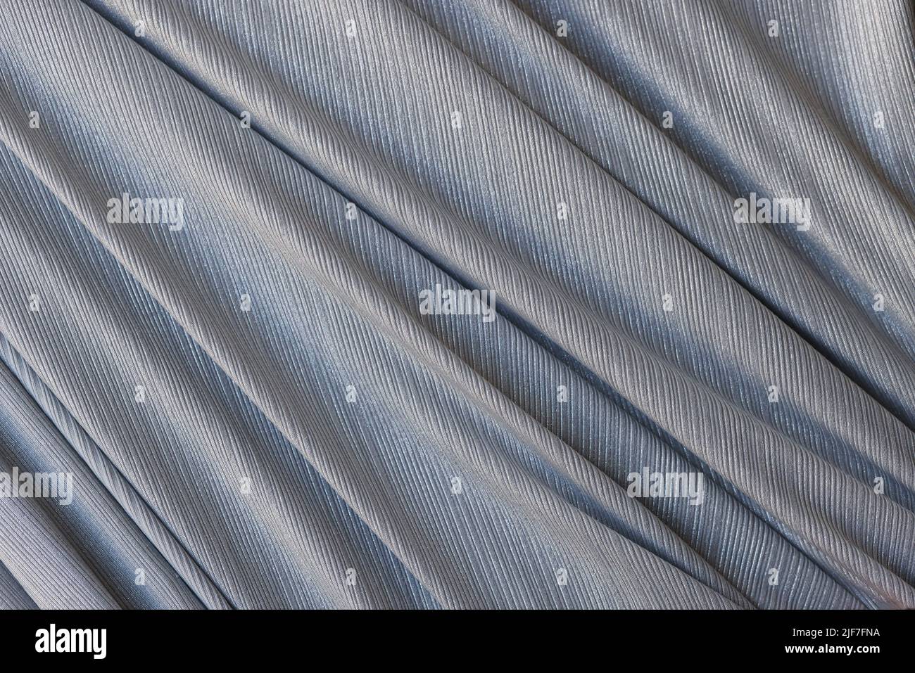 Closeup of gray synthetic fabric with folds Stock Photo