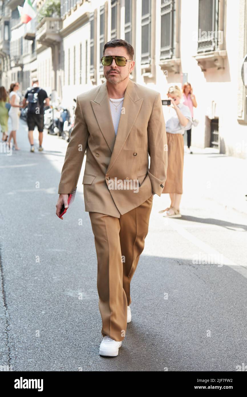 MILAN, ITALY - JUNE 20, 2022: Alex Badia before Giorgio Armani fashion show, Milan Fashion Week street style Stock Photo