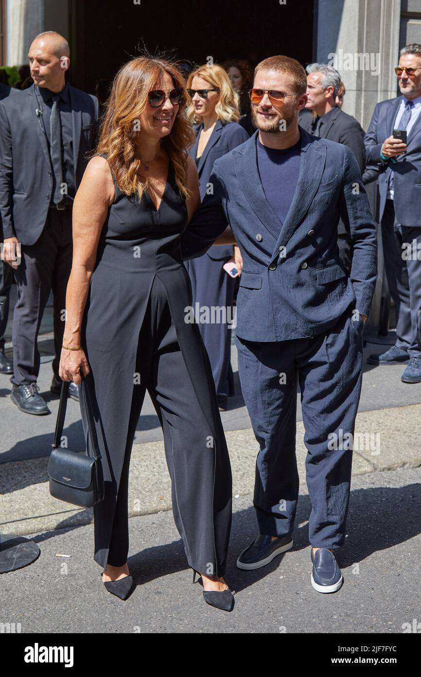 MILAN, ITALY - JUNE 20, 2022: Roberta Armani and Scott Eastwood before Giorgio Armani fashion show, Milan Fashion Week street style Stock Photo