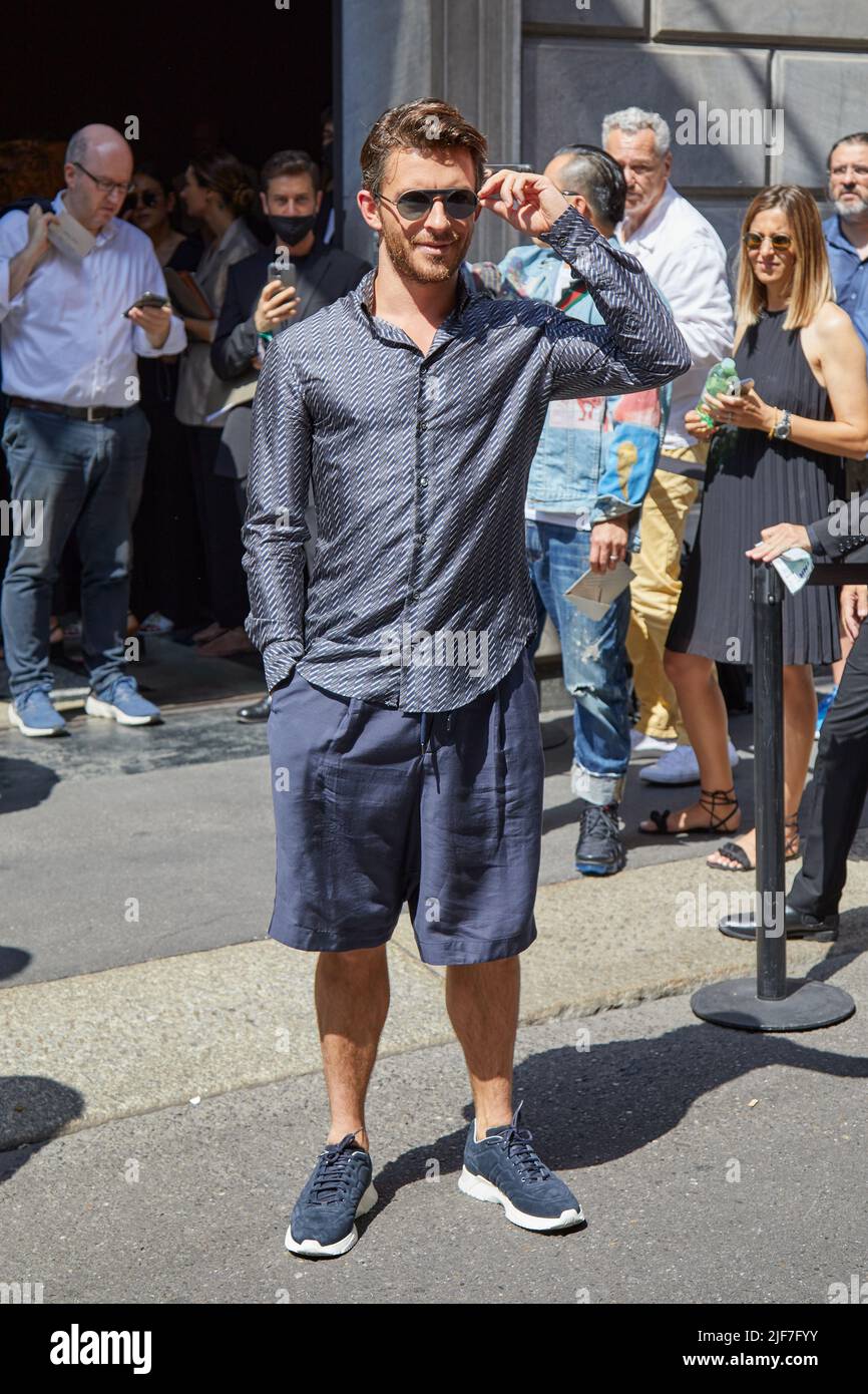 MILAN, ITALY - JUNE 20, 2022: Jonathan Bailey before Giorgio Armani fashion show, Milan Fashion Week street style Stock Photo