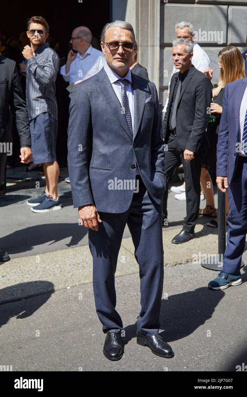 MILAN, ITALY - JUNE 20, 2022: Mads Mikkelsen before Giorgio Armani fashion show, Milan Fashion Week street style Stock Photo
