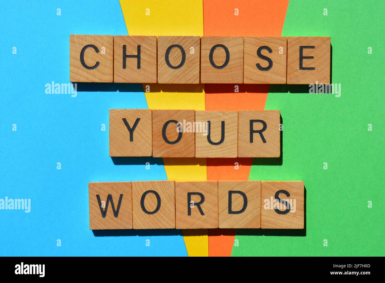 Choose Your Words, phrase in wooden alphabet letters isolated on multicolour background Stock Photo