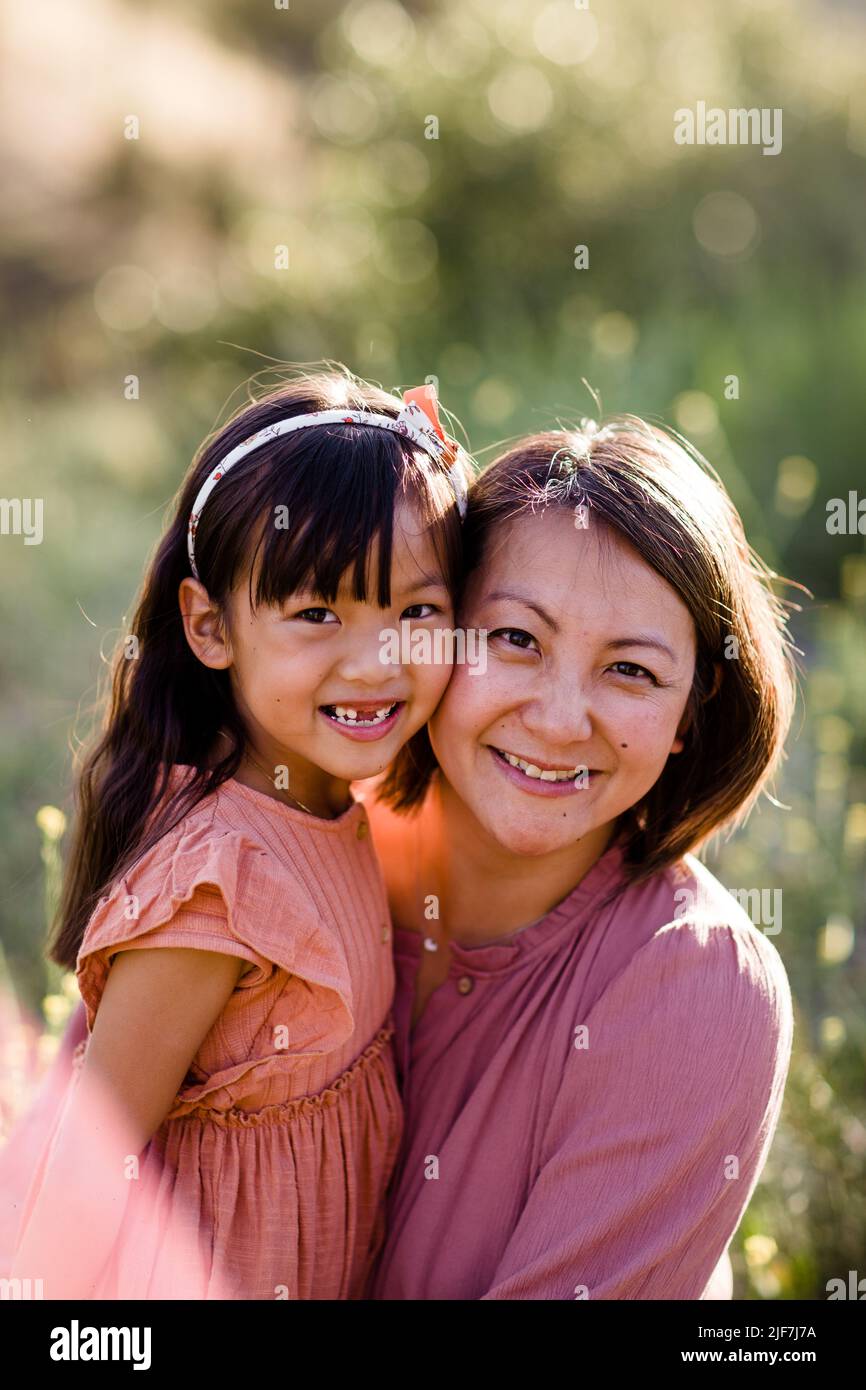 Portrait of Asian Mother & Daughter in Park in San Diego Stock Photo