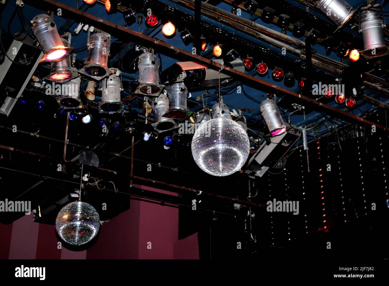stage grill with colored lights and disco balls Stock Photo
