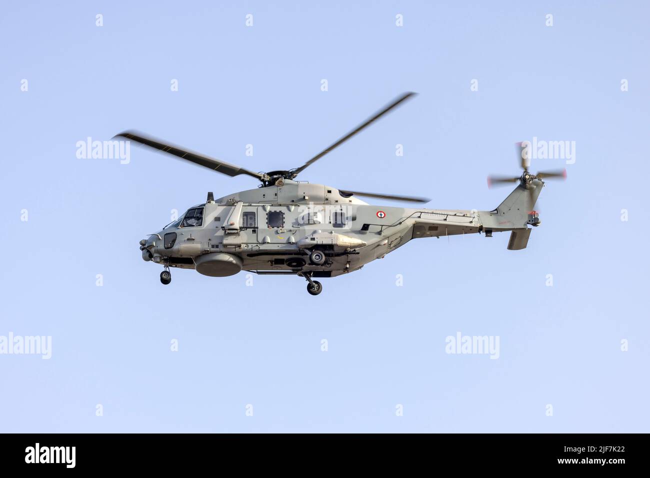 French Navy NHI NH-90 NFH (Reg.: 6) helicopter performing some approaches on runway 23 in the early morning. Stock Photo