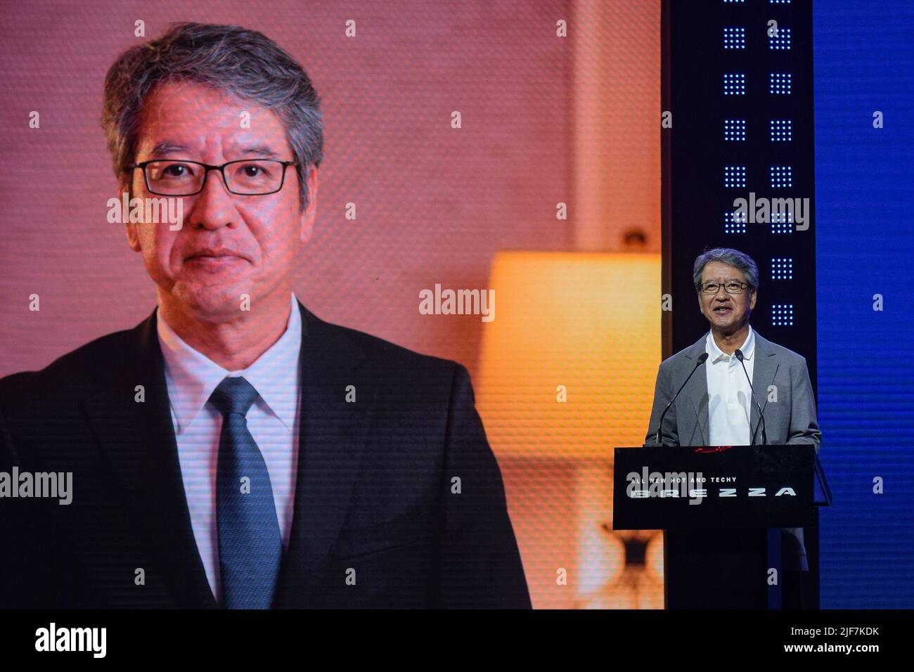 Gurugram, Haryana, India. 30th June, 2022. Managing Director & CEO Maruti Suzuki India Limited Hisashi Takeuchi during his speech at the launch event of Maruti Suzuki Brezza at Gurugram, India (Credit Image: © Kabir Jhangiani/Pacific Press via ZUMA Press Wire) Stock Photo