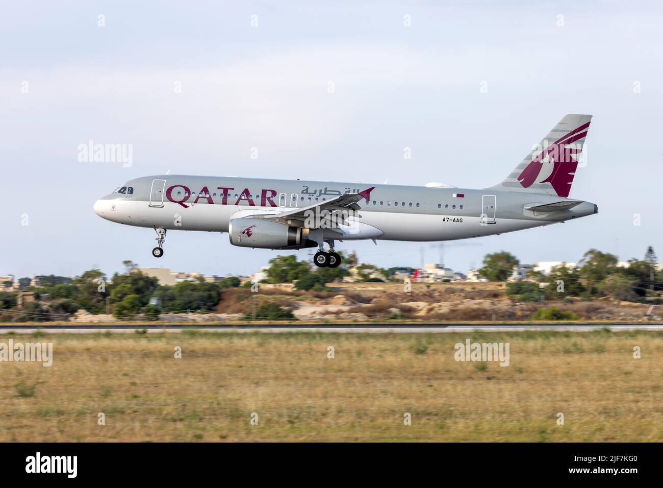 Qatar Airways (Qatar Amiri Flight) Airbus A320-232 (REG: A7-AAG) arriving runway 31. Stock Photo