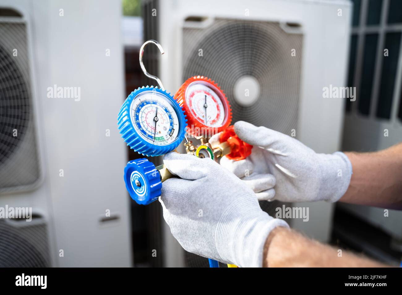 Industrial Air Conditioning Technician. HVAC Cooling System Repair Stock Photo Alamy