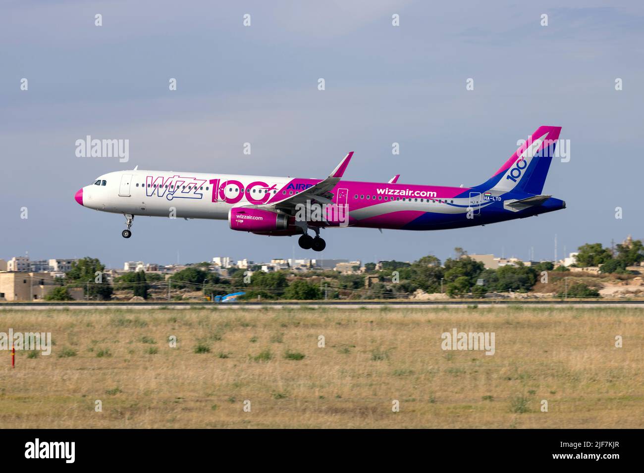 Wizz Air Airbus A321-231 (Reg.: HA-LTD) wearing a special 100th Airbus for Wizz Air livery. Stock Photo
