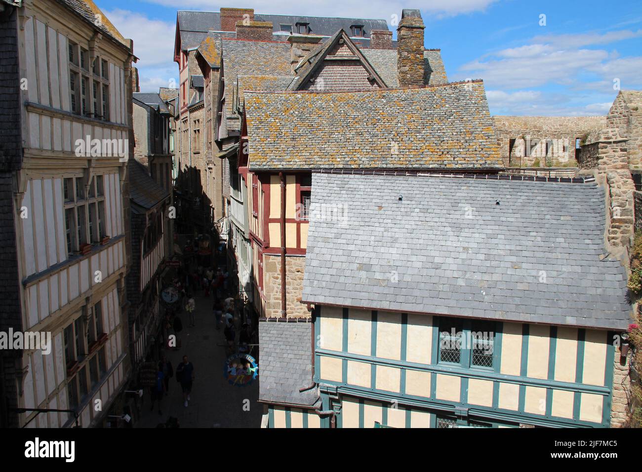 old houses and alley at le montsaintmichel in normandy (france Stock