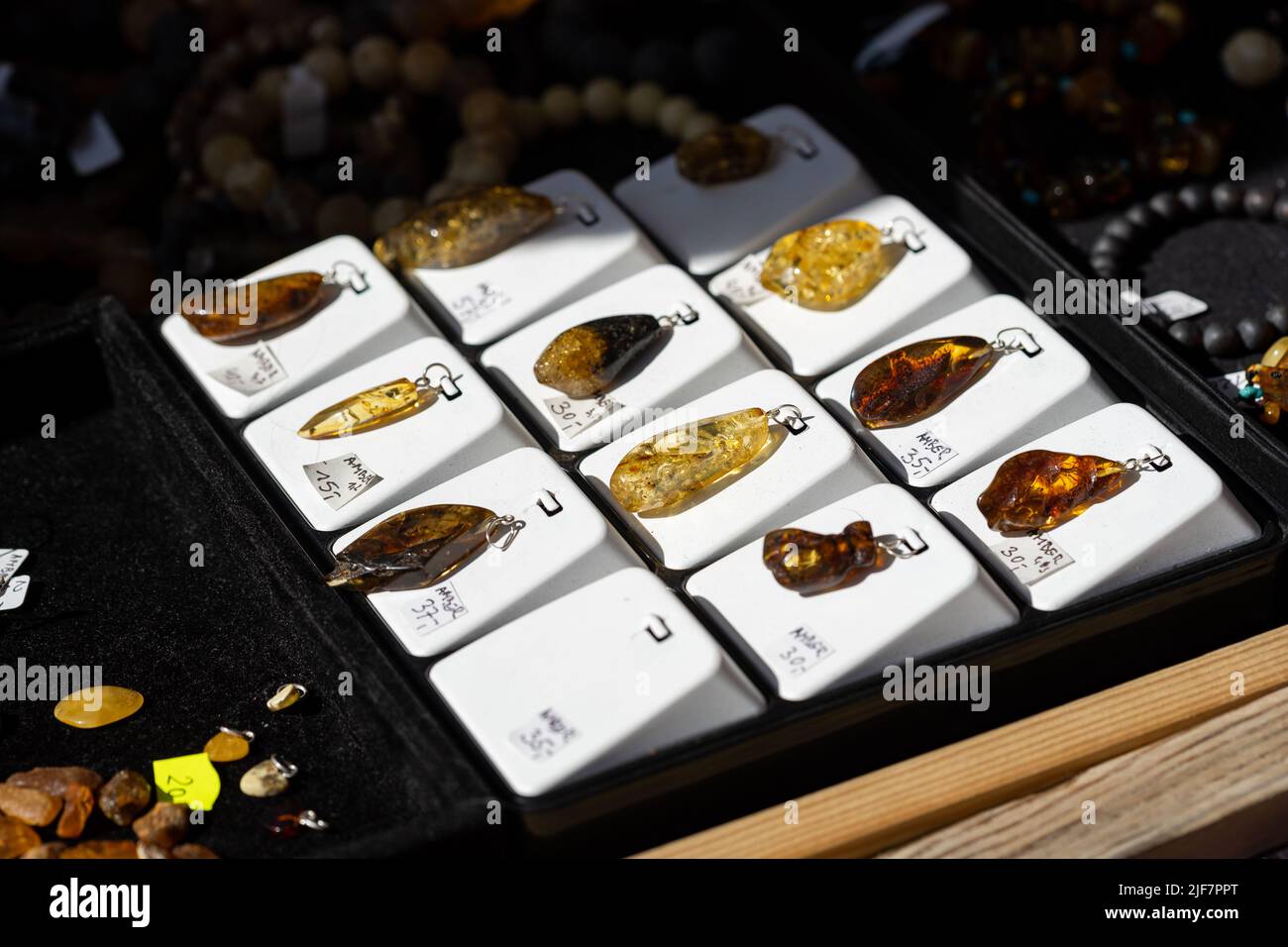 Amber jewelry on sale, baltic amber pendants, group of objects, detail ...