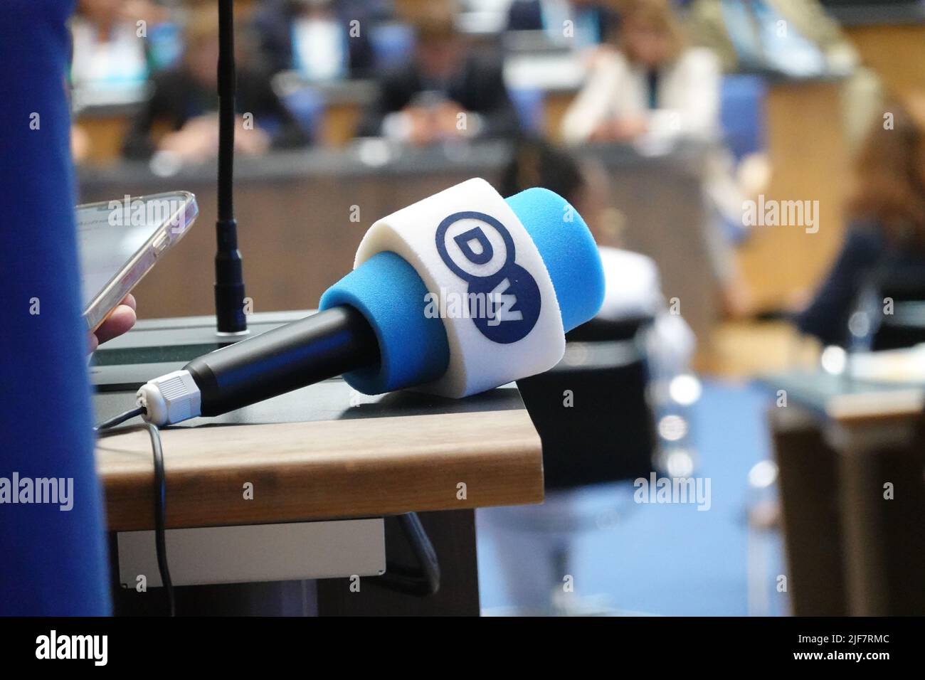 Logo of German state broadcaster Deutsche Welle on a microphone Stock Photo