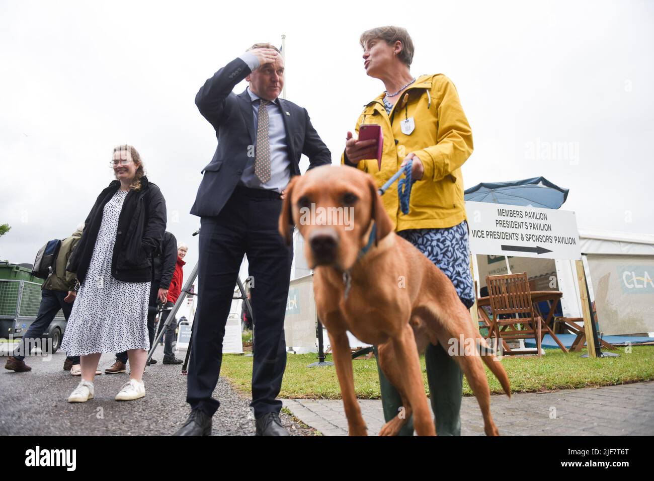 George Eustice MP, Secretary of State for Environment, Food and Rural Affairs of the United Kingdom, MP For Camborne, Meets with Selaine Saxby MP for North Cornwall, and her Dog Henry. At the Devon County Show. Stock Photo