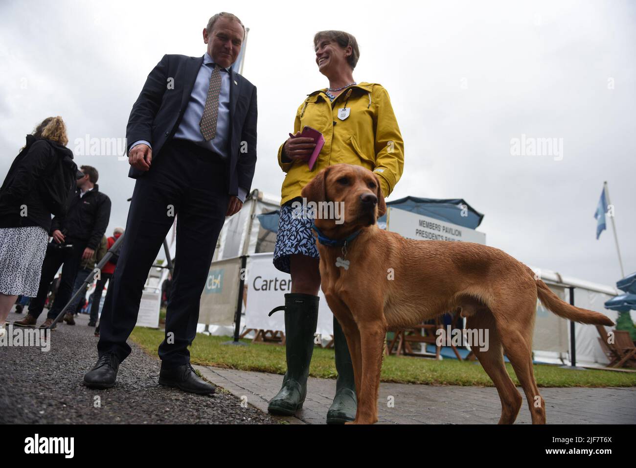 George Eustice MP, Secretary of State for Environment, Food and Rural Affairs of the United Kingdom, MP For Camborne, Meets with Selaine Saxby MP for North Cornwall, and her Dog Henry. At the Devon County Show. Stock Photo