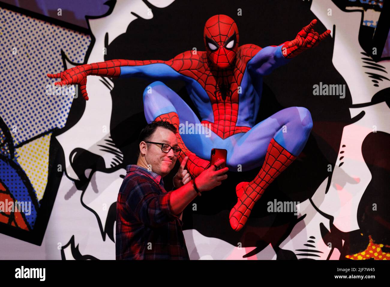 Brian Crosby takes a selfie as the Comic-Con Museum unveils the world-premiere exhibit of Marvel’s friendly neighborhood Super Hero Spiderman, in celebration of the characters' 60th anniversary in San Diego, California, U.S., June 30, 2022.    REUTERS/Mike Blake Stock Photo