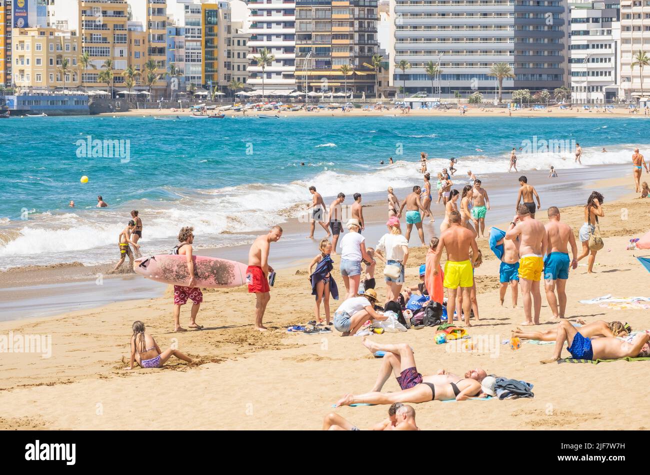 Las Palmas, Gran Canaria, Canary Islands, Spain. 30th June, 2022. Tourists, many from the UK, bask on the city beach in Las Palmas on Gran Canaria; a popular holiday destination for many UK holidaymakers. Credit: Alan Dawson/ Alamy Live News. Stock Photo