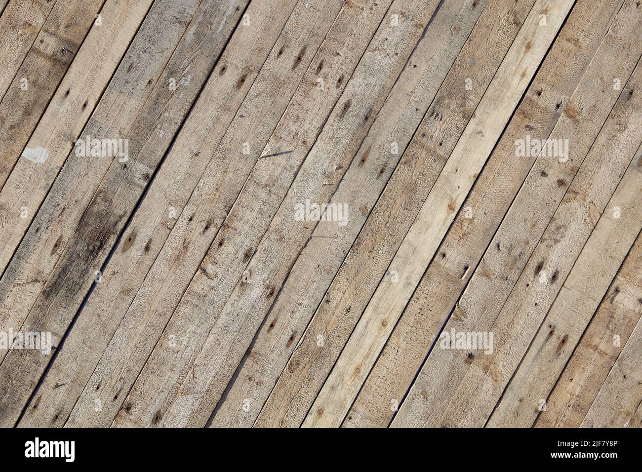 Wooden texture of picket fence, nailed for backgrounds. Stock Photo