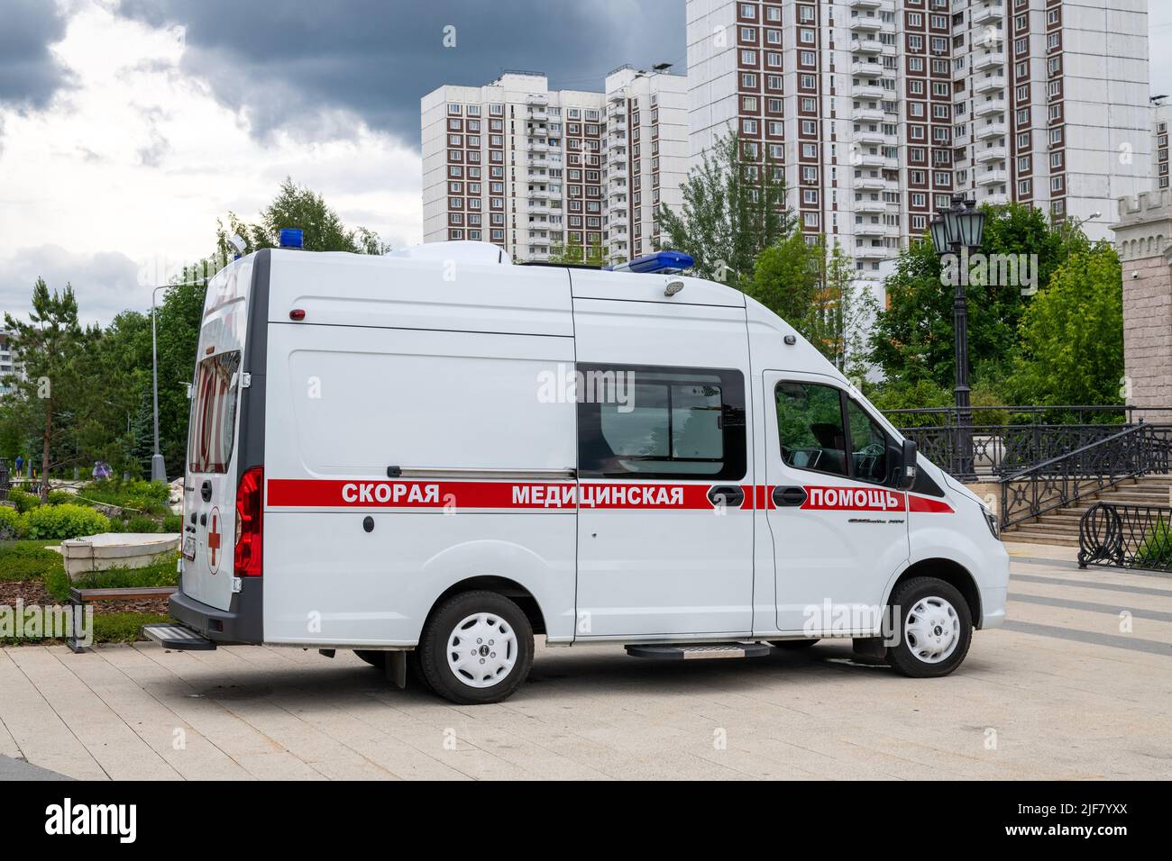 Moscow, Russia - June 17. 2022. An ambulance against the backdrop of residential buildings in Zelenograd Stock Photo