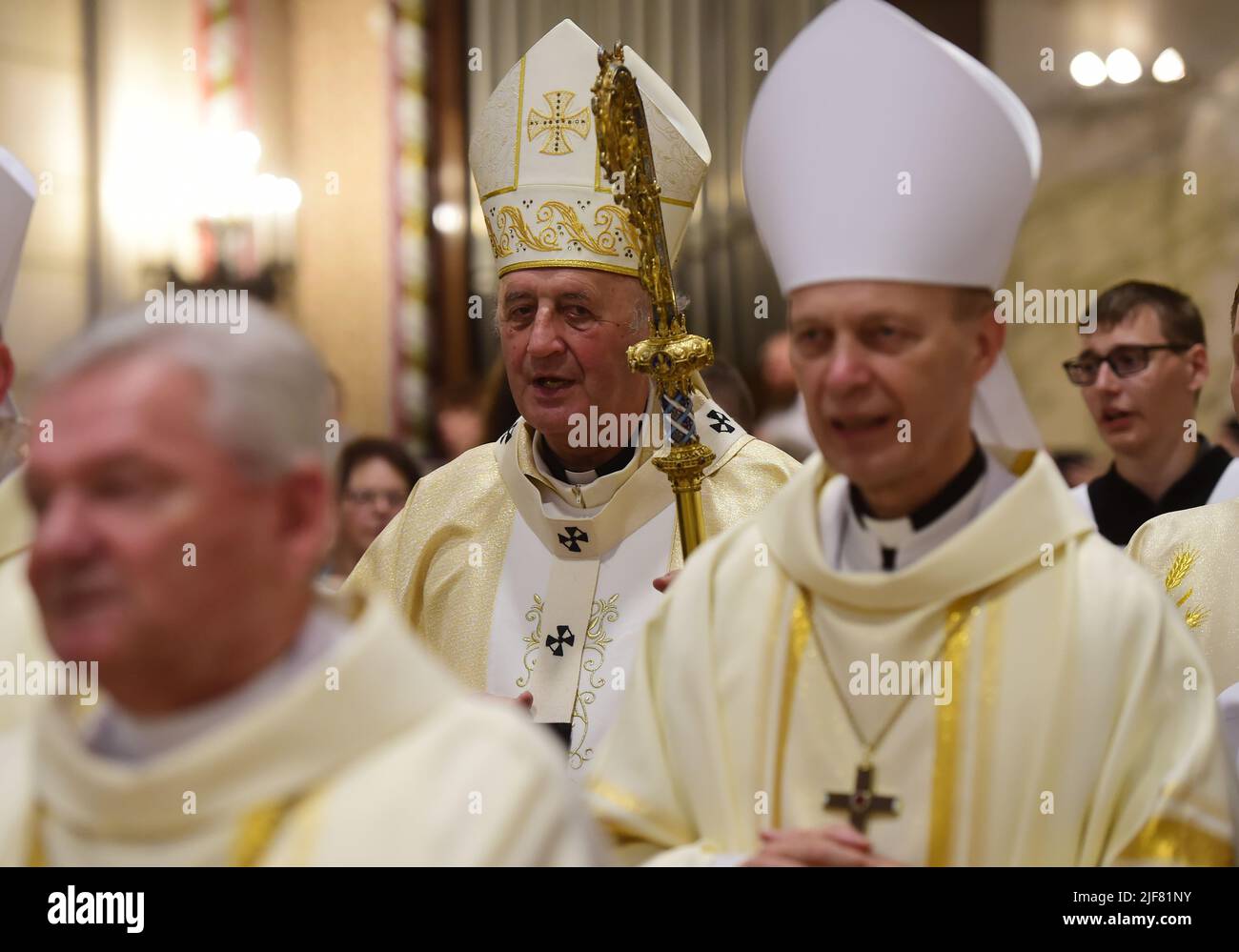 Olomouc, Czech Republic. 30th June, 2022. Farewell mass of Olomouc Archbishop Jan Graubner, center, who will take up position of Prague Archbishop, was held on June 30, 2022, at the Saint Wenceslas Cathedral in Olomouc, Czech Republic. On the right side is seen Auxiliary Bishop Antonin Basler. Credit: Ludek Perina/CTK Photo/Alamy Live News Stock Photo