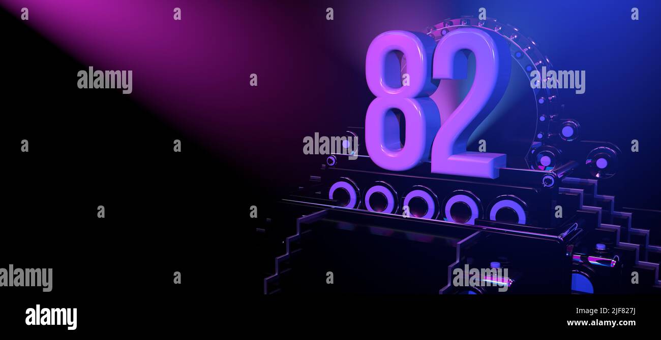 Solid number 82 on a black reflective stage with stairs and adorned with circles, illuminated with blue and red lights against a black background. Wit Stock Photo