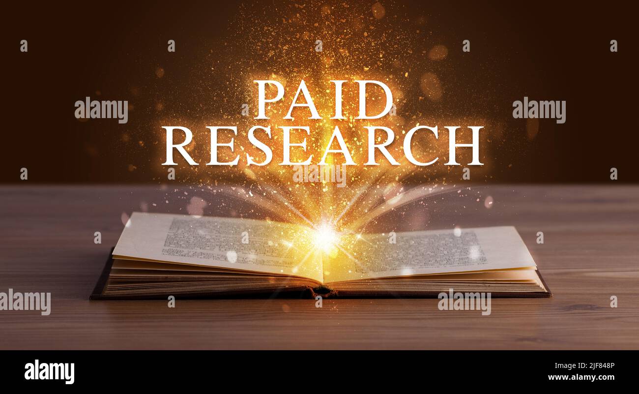 Educational inscription coming out from an open book Stock Photo - Alamy