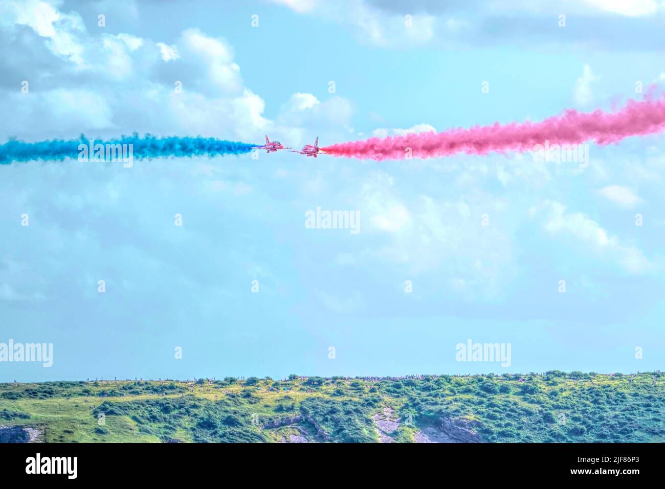 Red Arrows jets head on precision RAF team and Brean Down Somerset colourful smoke Stock Photo