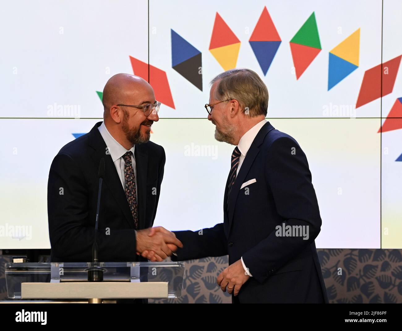 Prague, Czech Republic. 30th June, 2022. European Council head Charles Michel, left, and Czech Prime Minister Petr Fiala, right, shake hands during the press conference after meeting ahead of start of Czech EU presidency, on June 30, 2022, in Prague, Czech Republic. Credit: Michal Krumphanzl/CTK Photo/Alamy Live News Stock Photo