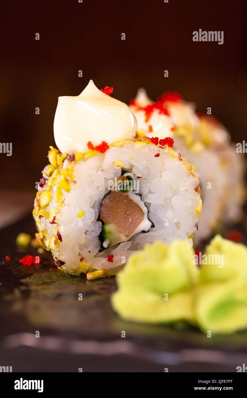 rice rolls with stuffing close-up serving , japanese cuisine. Stock Photo